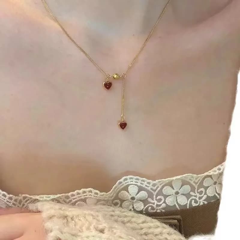 Collana con Pendente Doppio Cuore in Acciaio Oro