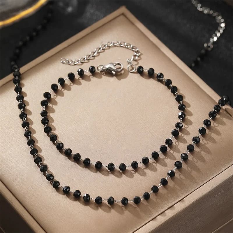 Set Collana e Bracciale con Perle Nere su Catena