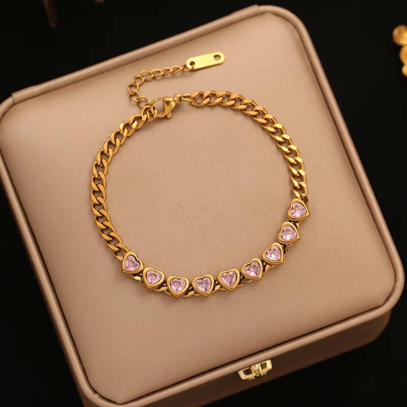 Bracciale rigido a catena con sfere dorate