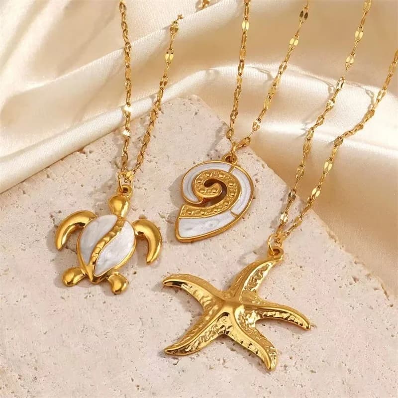 Collana con Ciondolo Stella Marina, Sole e Conchiglia di Perla, Oro