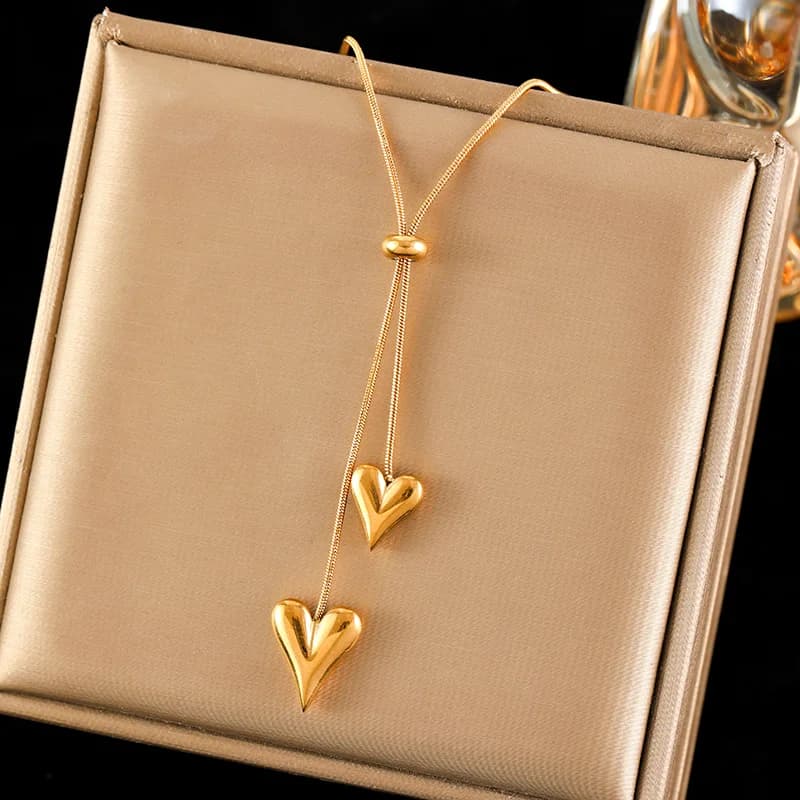 Collana con pendente in acciaio inox dorato