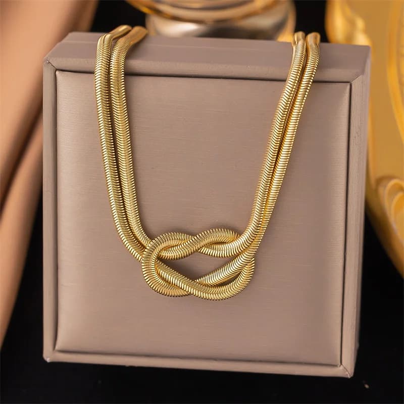 Set Collana e Bracciale Serpente Nodo Dorato