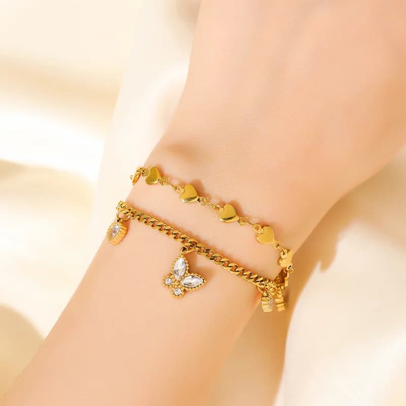 Bracciale charm testurizzato color oro catena da polso