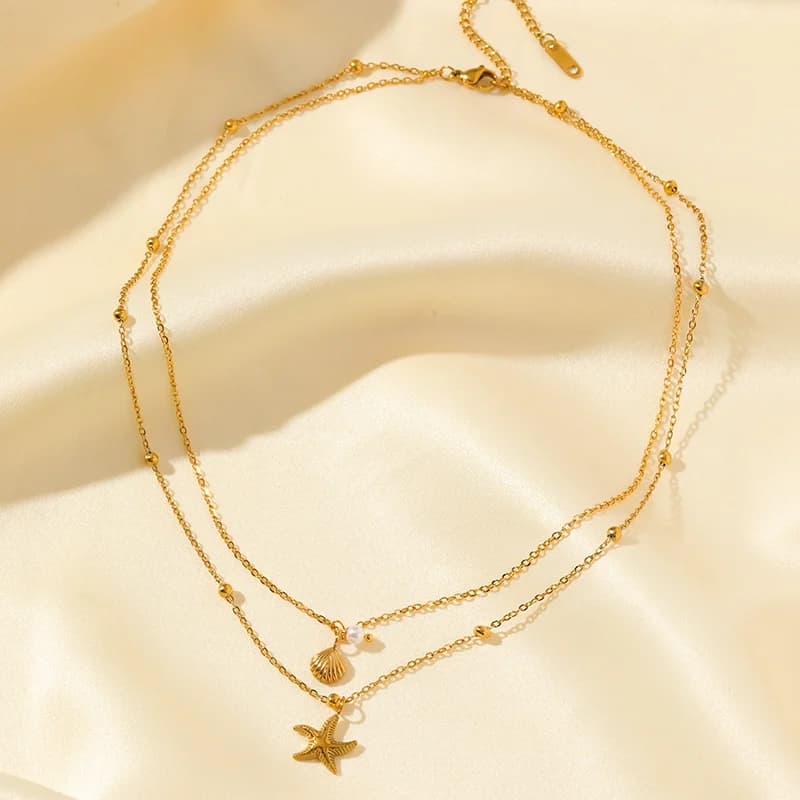 Set Collana e Orecchini con Pendente Stella Marina e Perla di Conchiglia