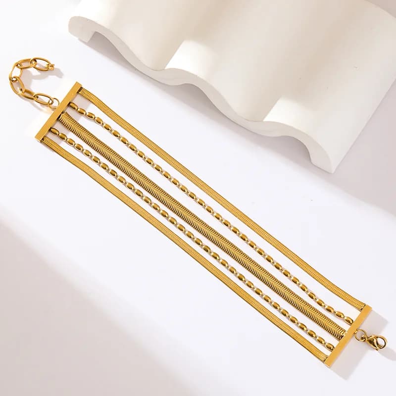 Bracciale largo multistrato in acciaio inox dorato