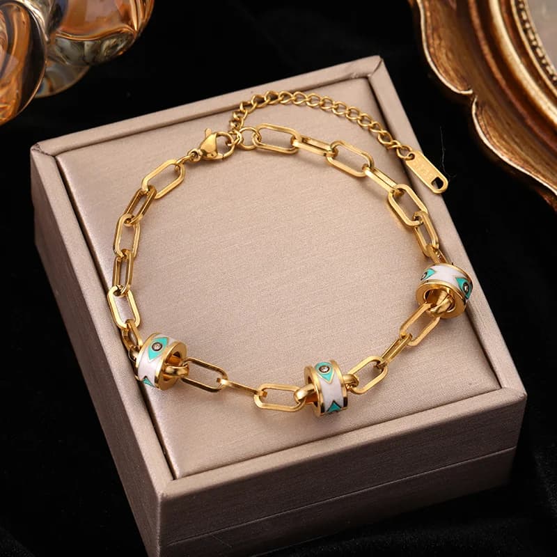 Bracciale a Maglie Multistrato con Ciondoli Color Oro