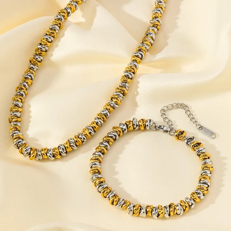 Set collana e bracciale a catena bicolore
