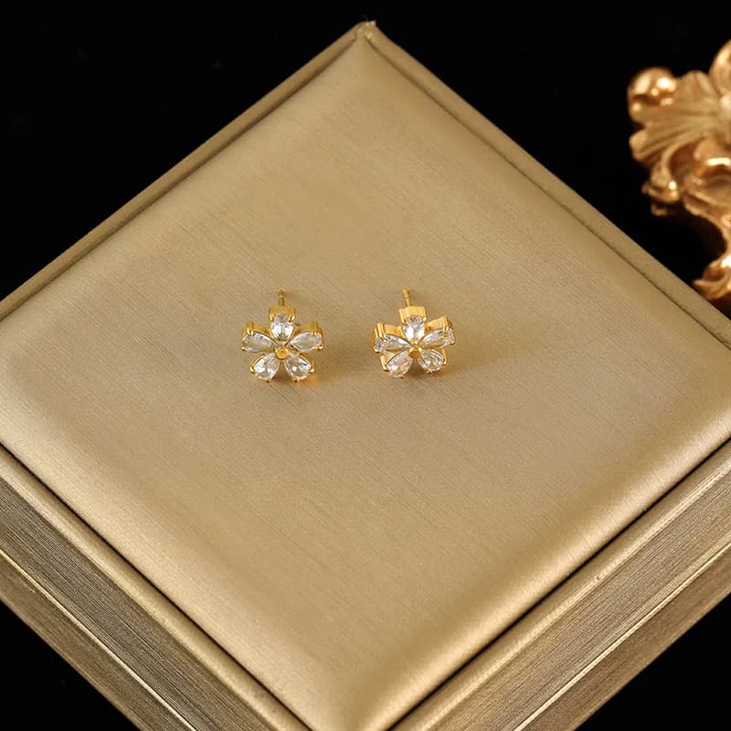Set gioielli con fiori in zirconia bianca
