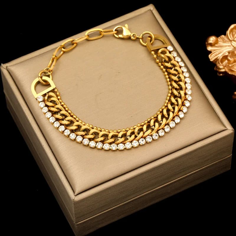 Bracciale largo multistrato in acciaio inox dorato