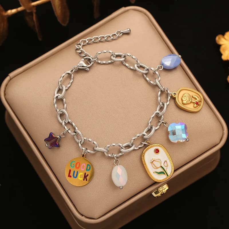Bracciale rigido con ciondoli a cuore in acciaio inox