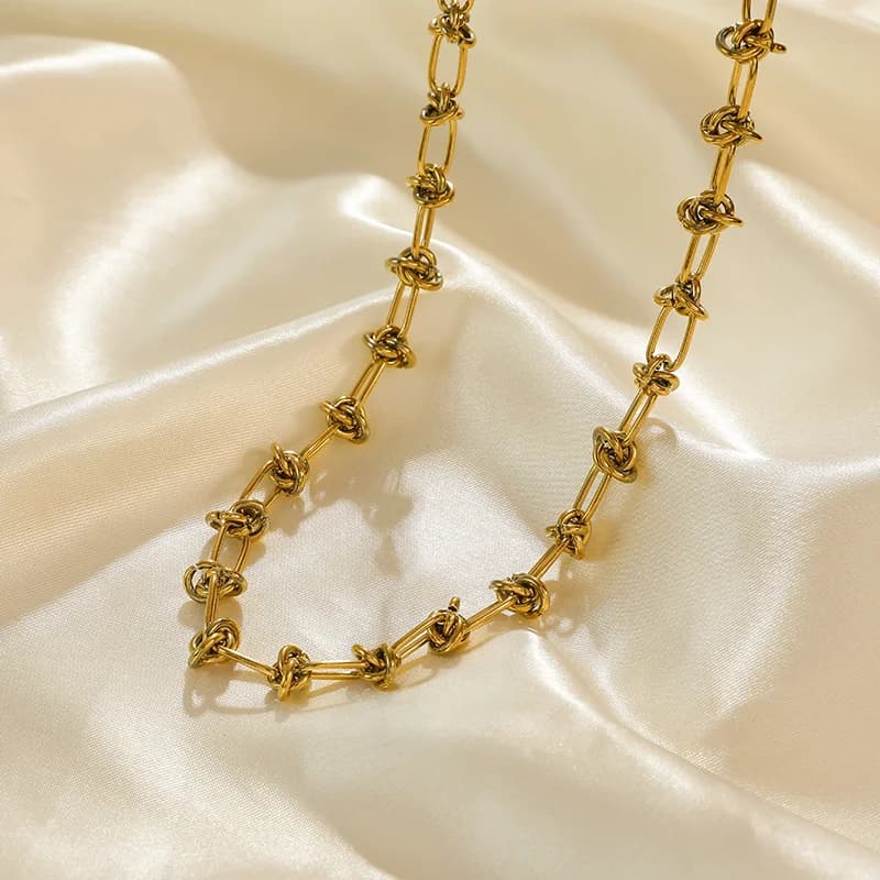 Set Collana e Bracciale con Catena Annodata, Oro