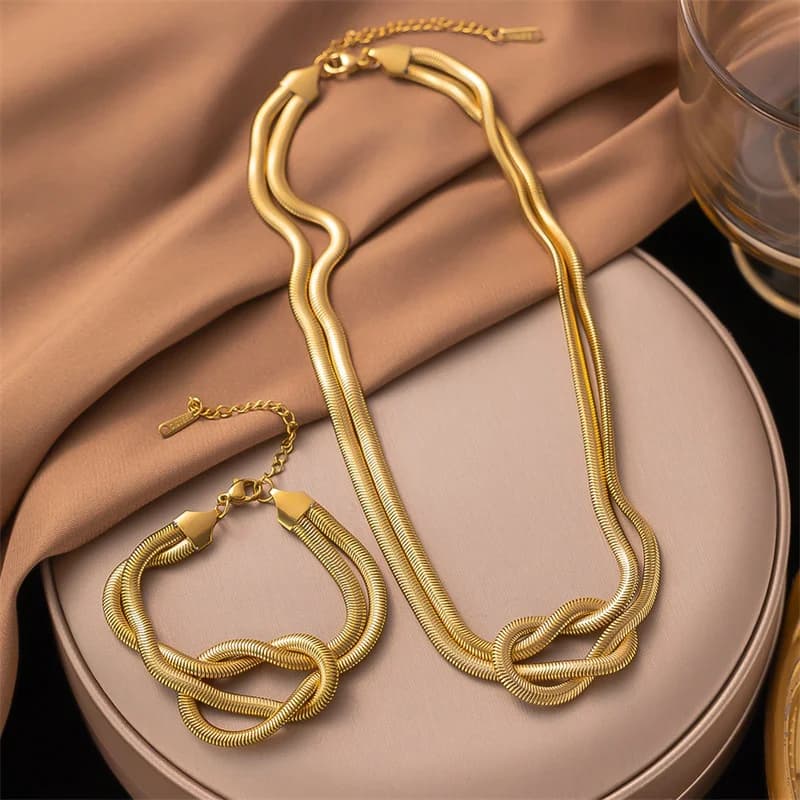 Set Collana e Bracciale Serpente Nodo Dorato