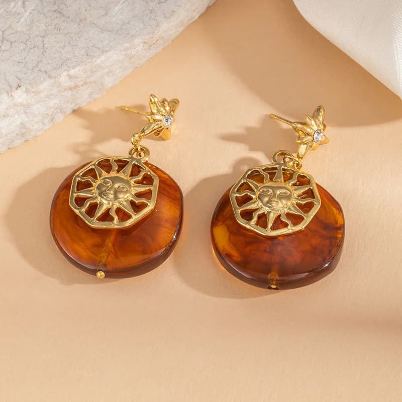 Orecchini pendenti vintage sole stella ambra