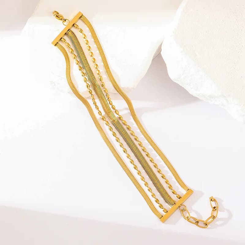Bracciale largo multistrato in acciaio inox dorato