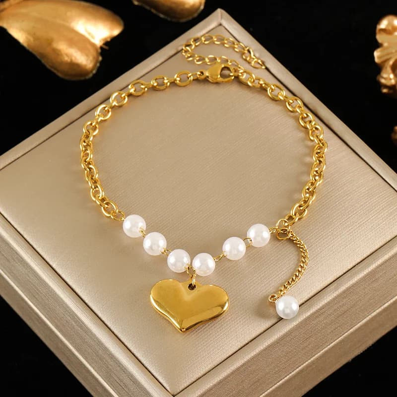 Bracciale charm testurizzato color oro catena da polso