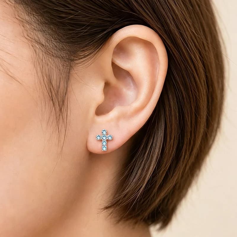 Piercing corpo a spirale con croce e zirconi in titanio