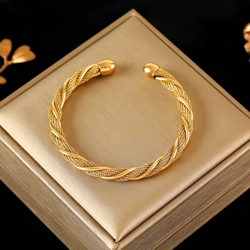 Bracciale rigido regolabile intrecciato in acciaio inox 316L color oro