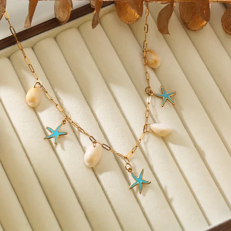Collana pendente con ricci di mare e stelle marine in acciaio inox 316L