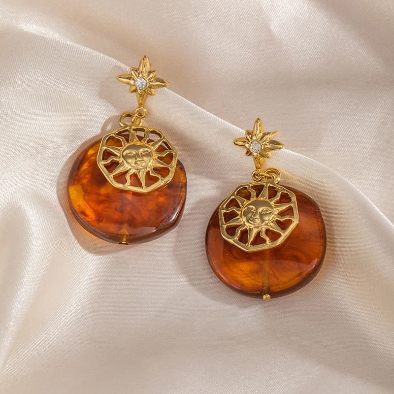 Orecchini pendenti vintage sole stella ambra