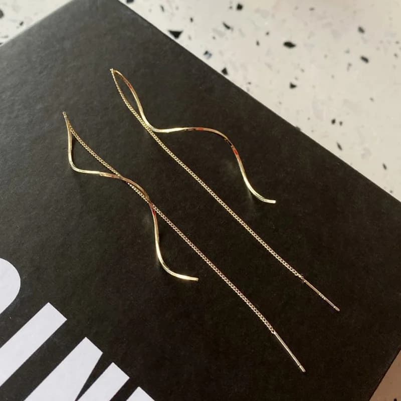 Orecchini pendenti con nappe irregolari in acciaio inox