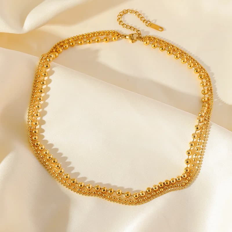 Collana girocollo multistrato con catene in oro
