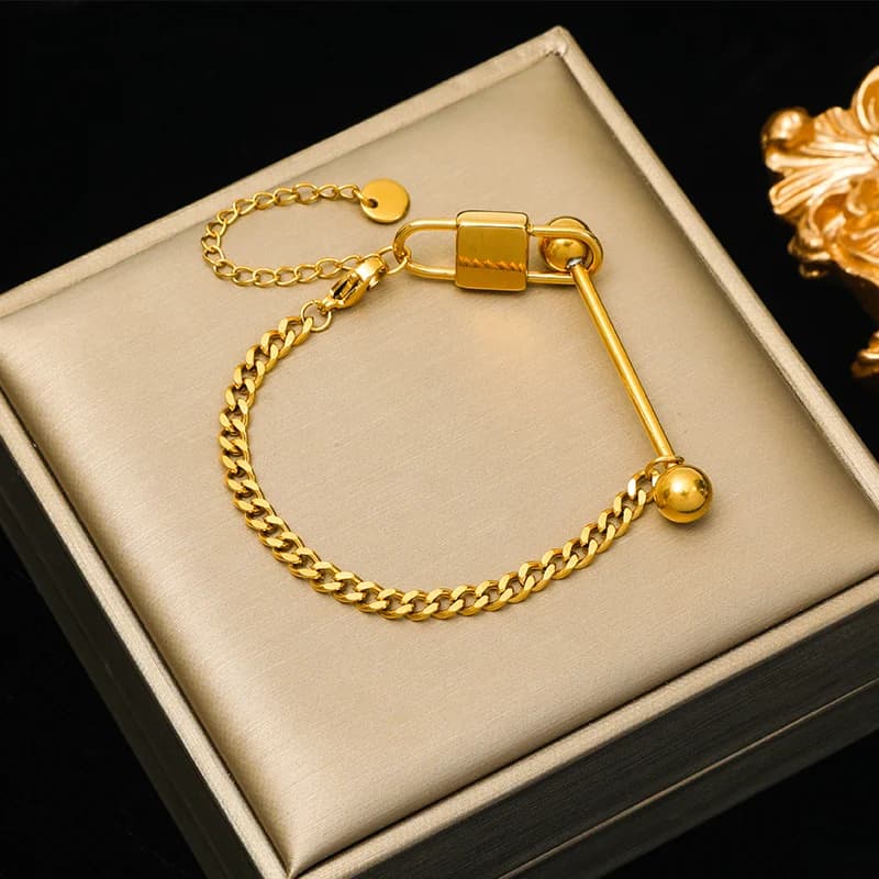 Set collana e bracciale con ciondolo lucchetto color oro