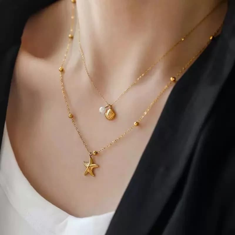 Collana con pendente Stella Marina e Conchiglia a Doppia Catena, Oro