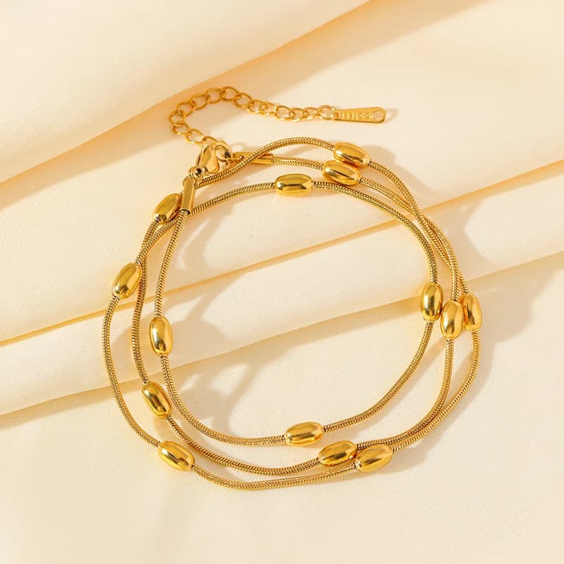 Set Collana e Bracciale Catena Multistrato Dorata