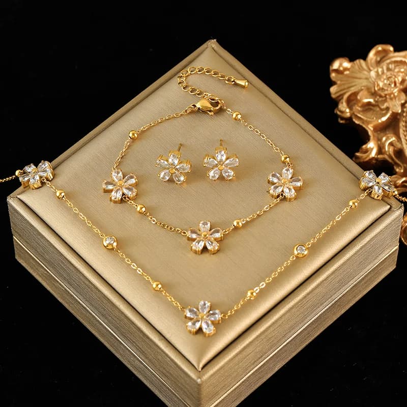 Set gioielli con fiori in zirconia bianca