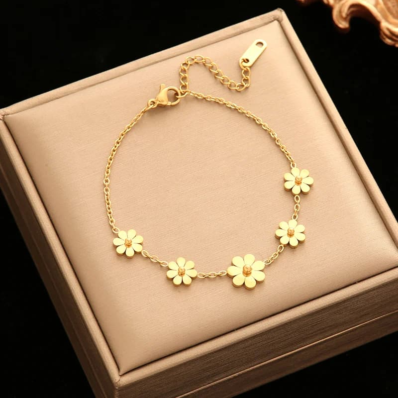 Bracciale charm con petali di fiore, color oro