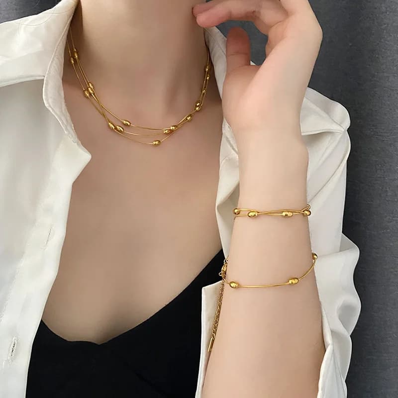Collana a strati in acciaio inox, oro/argento
