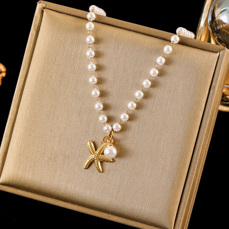 Collana pendente stella marina conchiglia e perla in acciaio inox