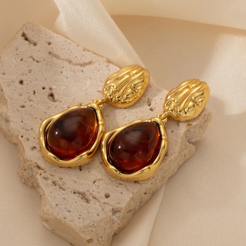 Orecchini pendenti vintage sole stella ambra