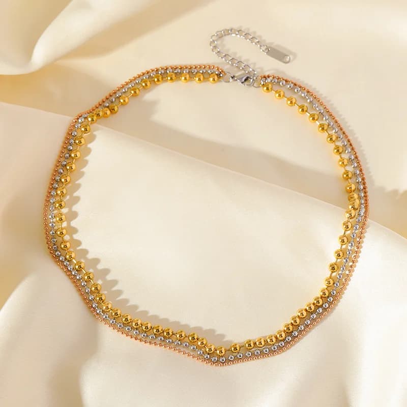 Collana girocollo multistrato con catene in oro