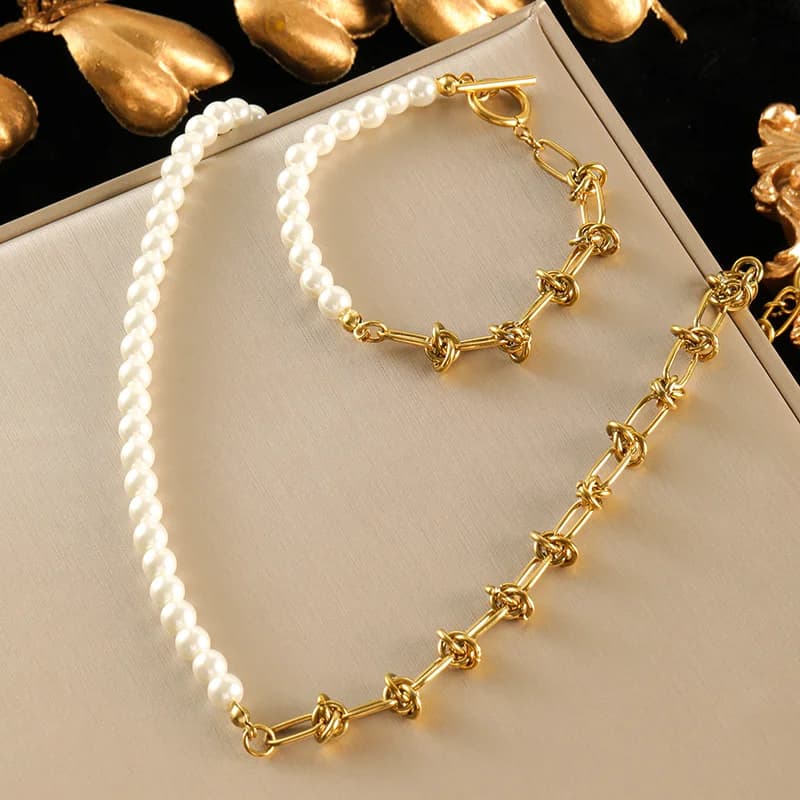 Set collana e bracciale con catena e perle sintetiche