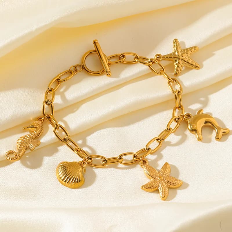 Bracciale con Ciondoli Sole Luna Stella Marina Dorati