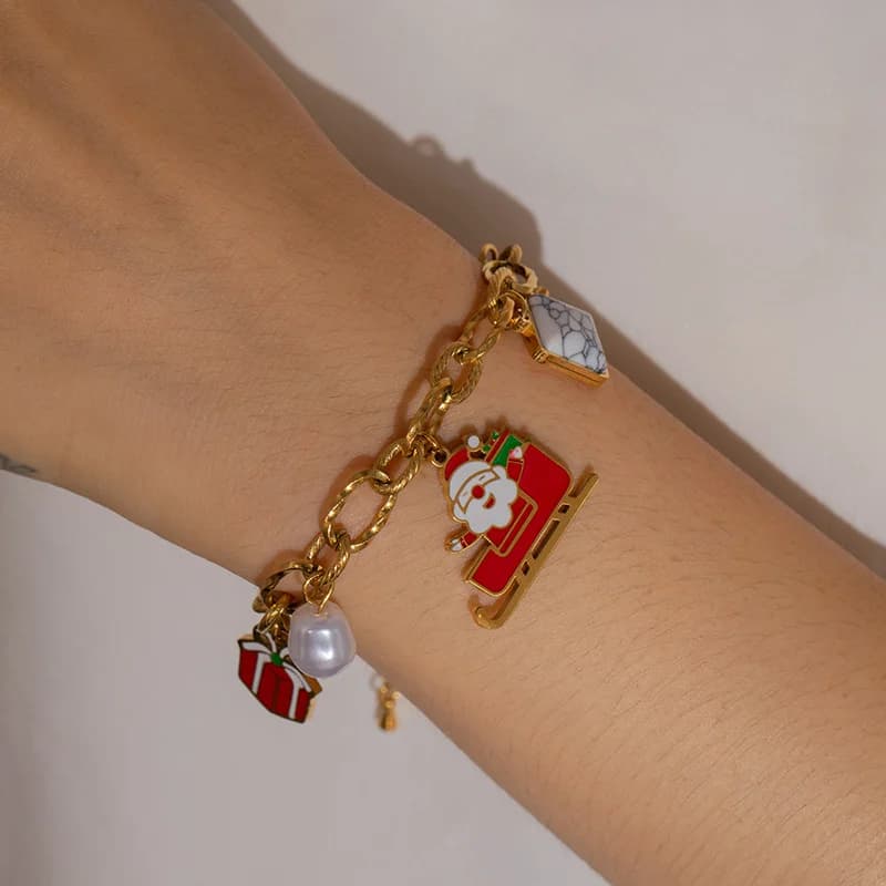 Bracciale charm con pupazzo di neve in acciaio inox