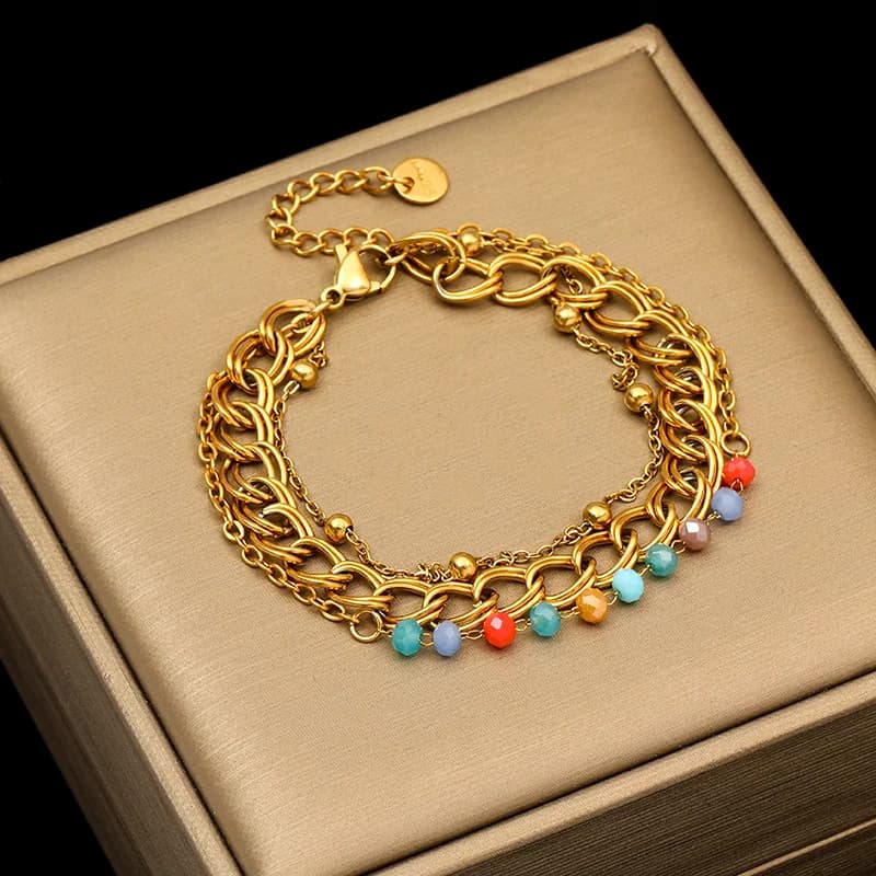 Bracciale largo multistrato in acciaio inox dorato