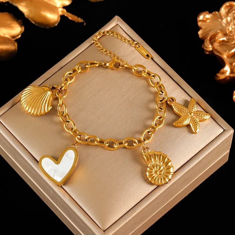 Bracciale con Ciondoli Sole Luna Stella Marina Dorati