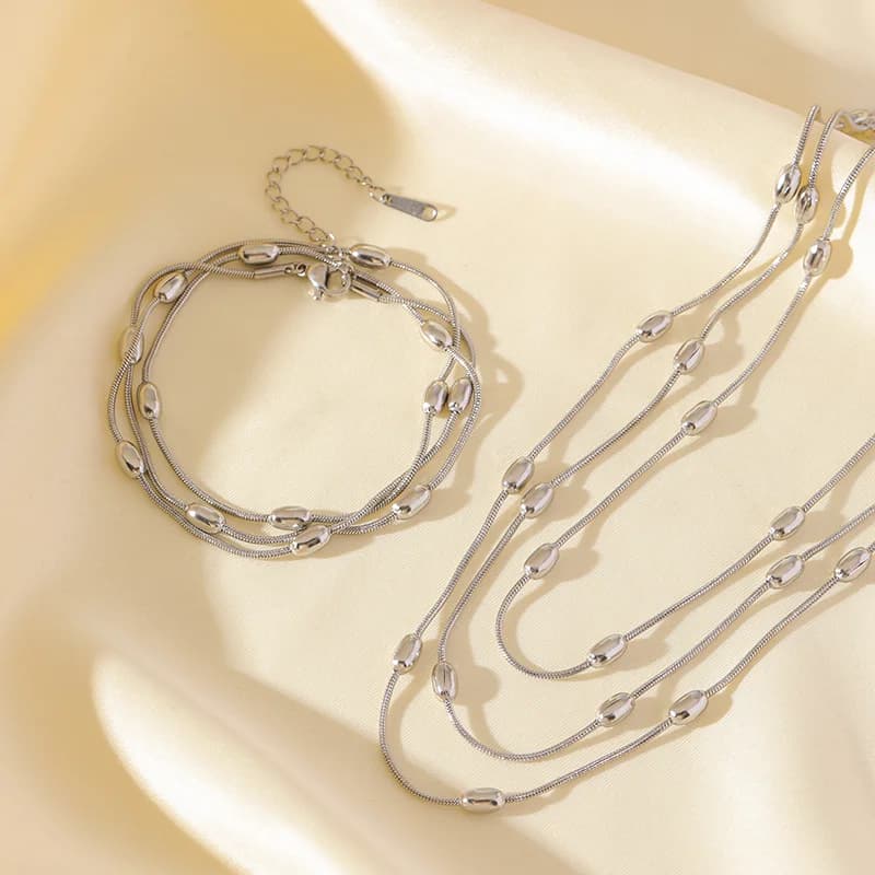 Set Collana e Bracciale Catena Multistrato Dorata