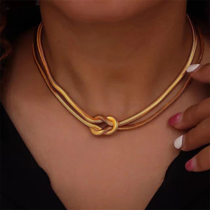 Set Collana e Bracciale Serpente Nodo Dorato