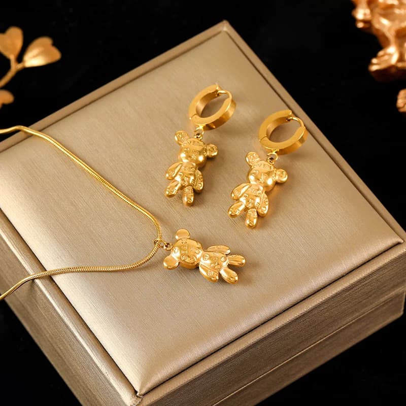 Set collana e orecchini orso e fiore, Oro