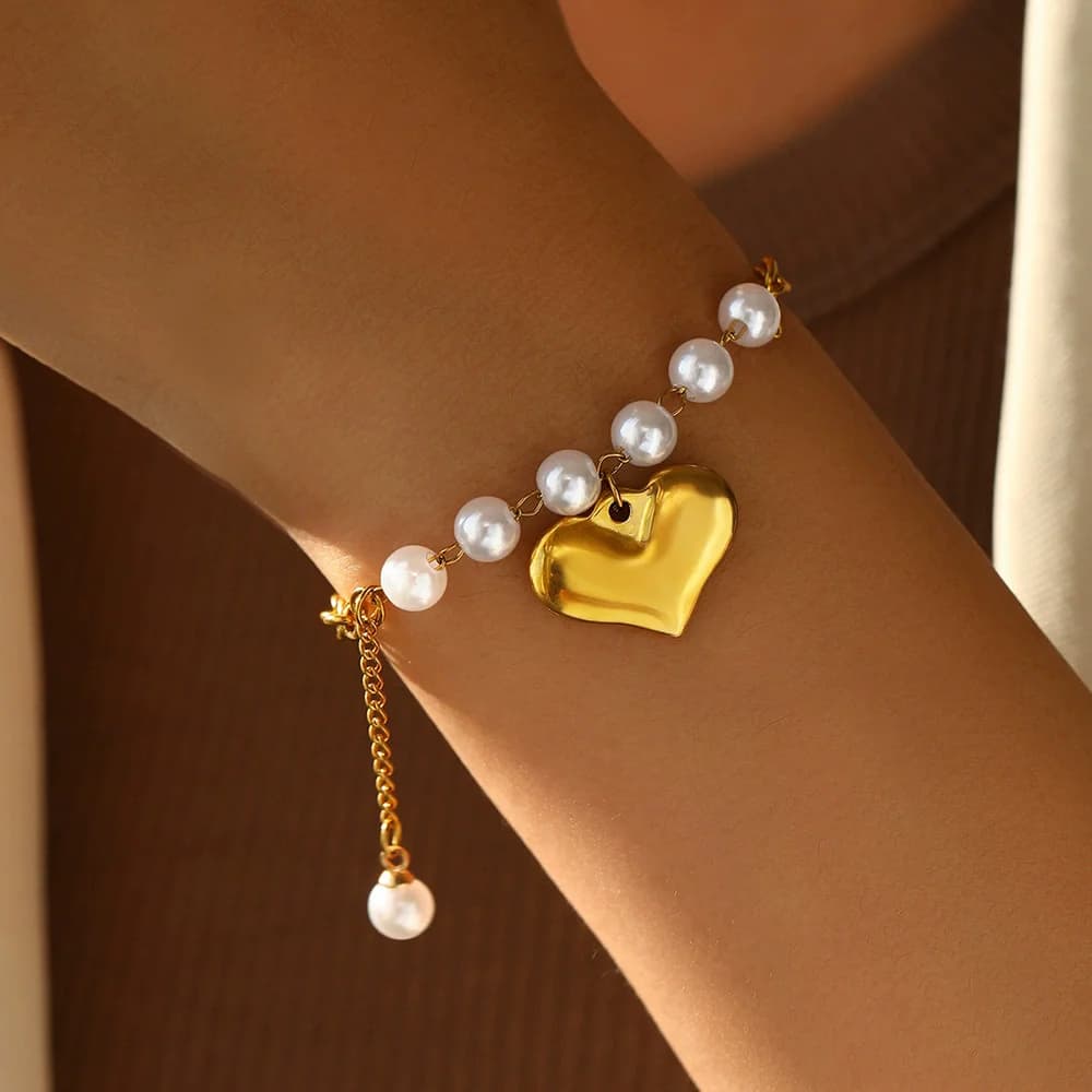Bracciale charm testurizzato color oro catena da polso