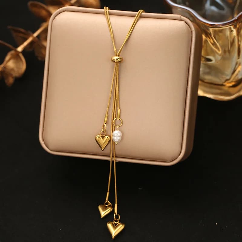 Collana con pendente in acciaio inox dorato