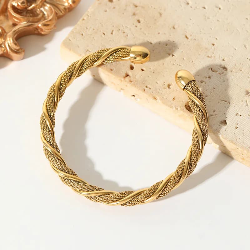 Bracciale rigido regolabile intrecciato in acciaio inox 316L color oro